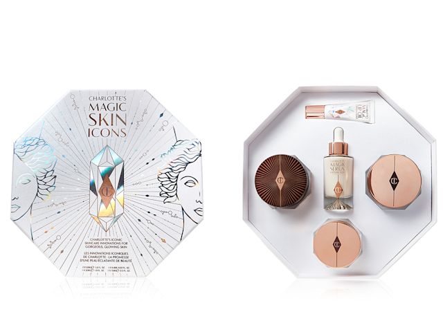 An open skincare kit with two face creams, eye cream, luminous face serum, and eye serum. 