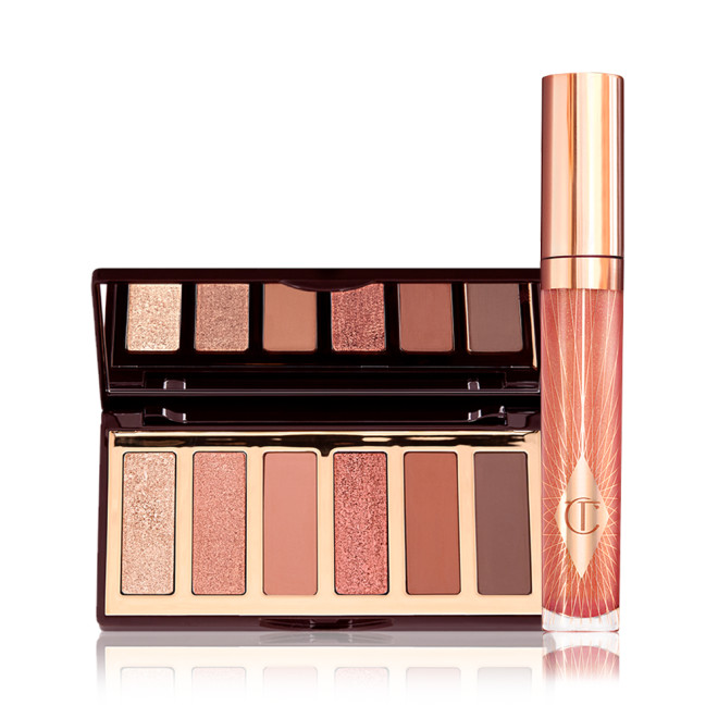 An open, 6-pan, mirrored-lid, matte and shimmery eyeshadow palette with shades in brown, gold, and peach along with a high-shine, peach lip gloss in a glass tube with a gold-coloured lid.