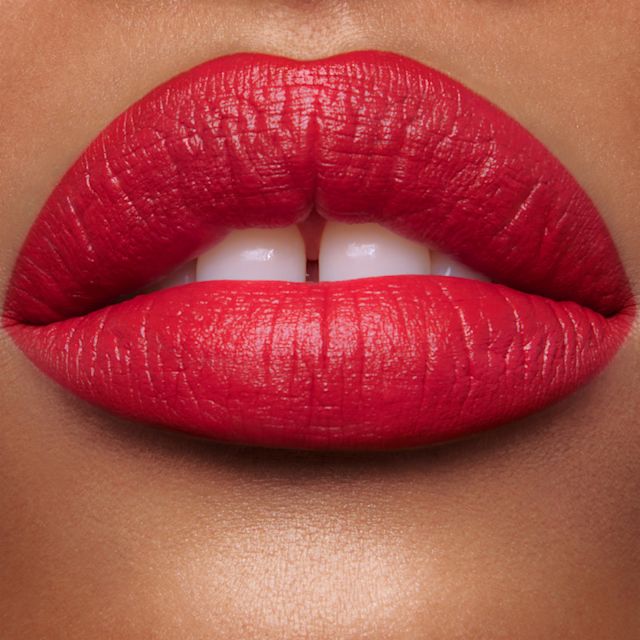 Model wearing Red Carpet Red and Hollywood Vixen lip liner and lipstick combination
