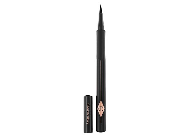 An open, black-coloured eyeliner pen with its cap next to it. 