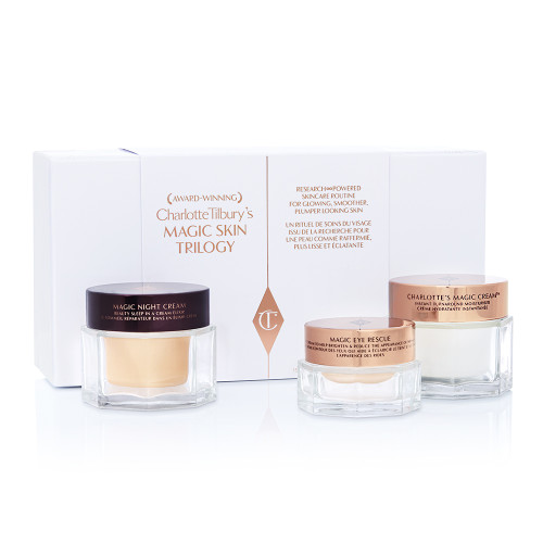 Travel-size face and eye cream in petite glass jars with sleek, metallic lids and an accompanying, white-coloured gift box. 