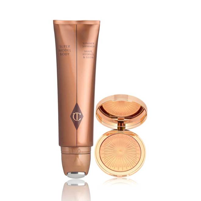 Body highlighter wand in glowy bronze-colour packaging with a powder highlighter compact in a glowy dark champagne colour with a mirrored-lid. 