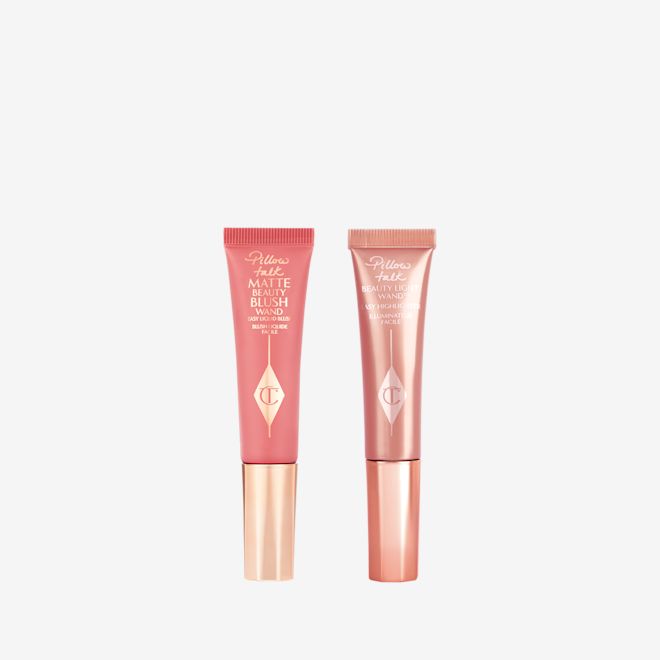 Blush and Glow Kit Wands A mini matte liquid blush wand in a pink colour and a mini liquid highlighter in a pink colour next to each other