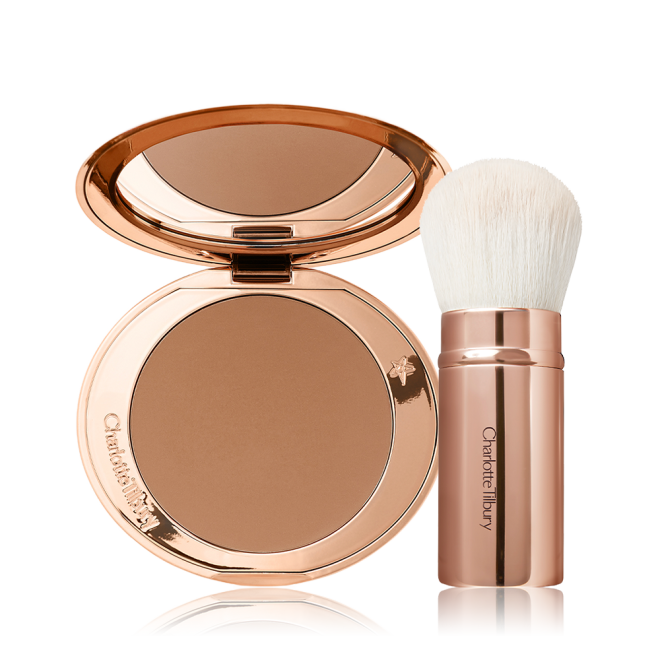 An open bronzer compact in a light brown shade and a kabuki brush with white-coloured bristles and a gold-coloured handle. 