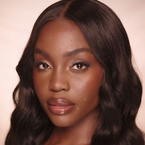 Anita wearing a wedding guest makeup look by Pro Artist Kelechi