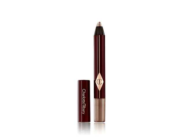 An open, chubby eyeshadow pencil in a shimmery bronze shade. 