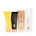 Two facial cleansers, one in lemon-yellow packaging and the other in charcoal-black, with rose-gold coloured lids, foundation in a frosted glass bottle with a gold-coloured lid, and light face cream in white-coloured packaging.