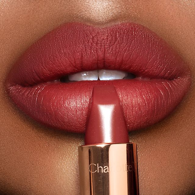Model wearing Walk of No Shame lip liner and lipstick combination