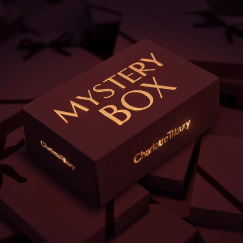Maroon and gold-coloured gift box with text on it that reads, 'Mystery box'