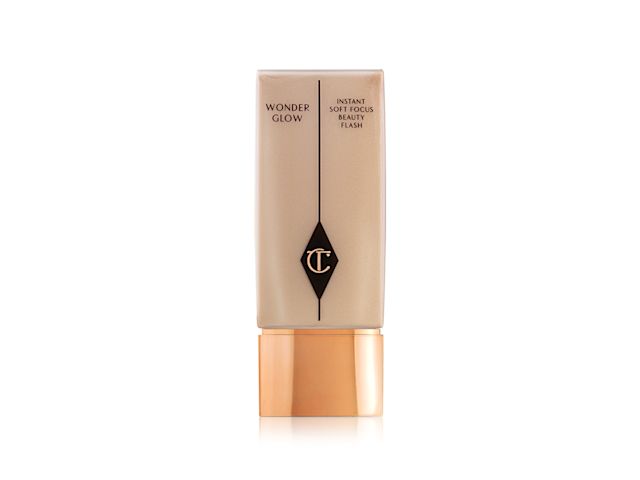 A light-beige-coloured primer in a rectangular translucent bottle with a rose-gold-coloured lid. 