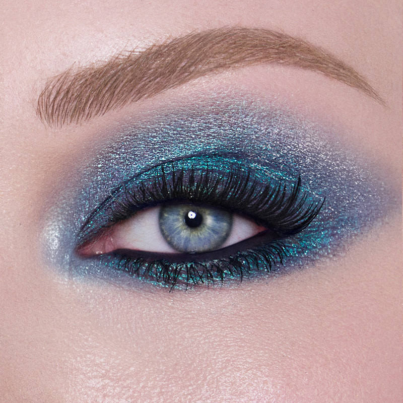 Model with blue eyes wearing Cosmic Rocks smokey eyeshadow look