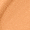 Swatch of a radiant, creamy concealer in a bright orange-gold desert-brown shade.