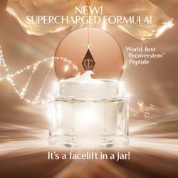 A luxurious open jar of cream with a glowing, golden background. The product lid, featuring the Charlotte Tilbury logo, hangs above the jar as a swirl of cream peaks from the top. Text on the image highlights the ‘New! Supercharged Formula’ with a ‘world‑first Recoverstem Peptide,’ and a claim that 4 out of 5 users agree it feels like ‘a facelift in a jar.