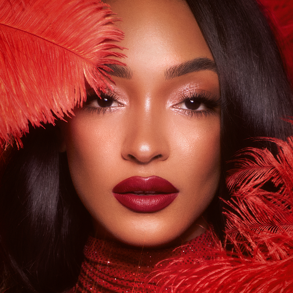 Jourdan Dunn wearing Hollywood Beauty Icon Lipstick in Cinematic Red as a cherry red bridal lipstick
