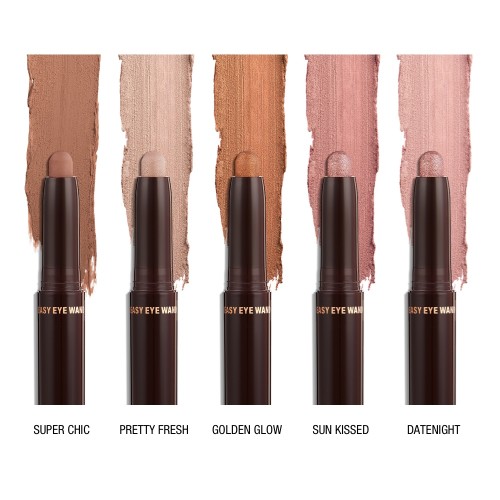 Five open eyeshadow sticks with matte and shimmery finish in shades of bronze, champagne, nude brown, nude pink, and nude rose. 