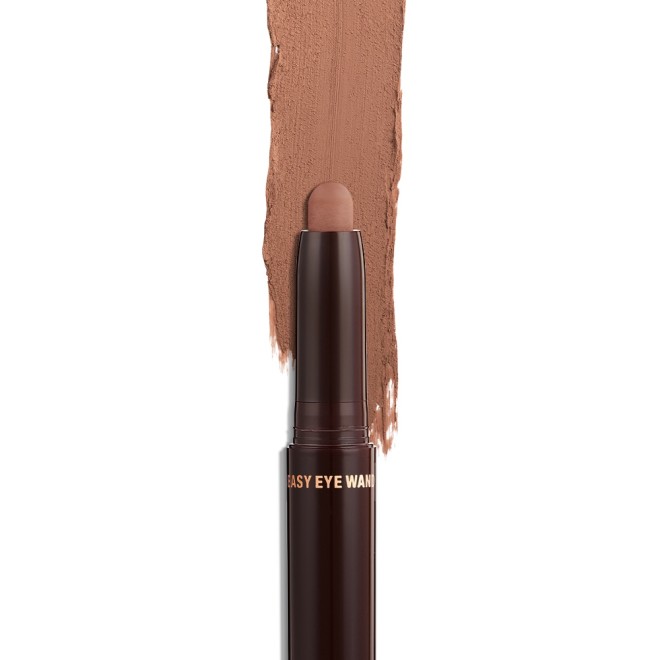 An open cream eyeshadow wand in a cool, nudey-brown matte shade in black-coloured tube.