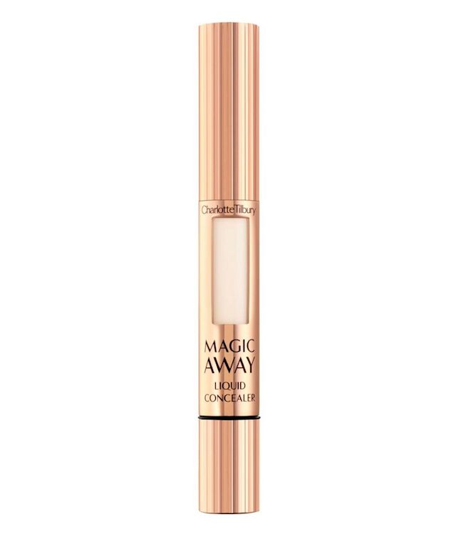 A liquid concealer in an ivory shade in golden-coloured packaging. 