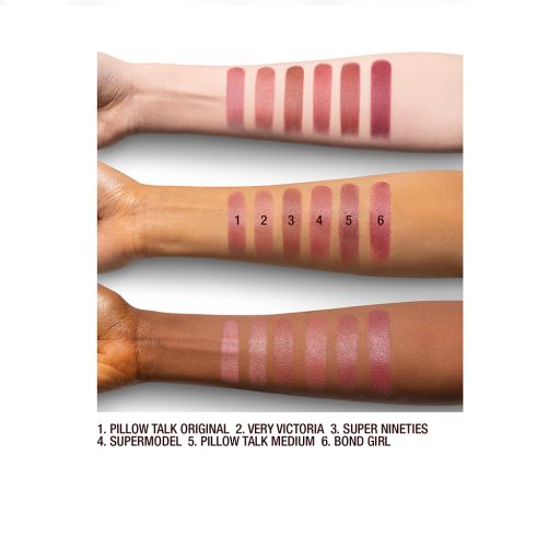 Fair, tan, and deep-skin arm swatches of matte lipsticks in various nude shades. 