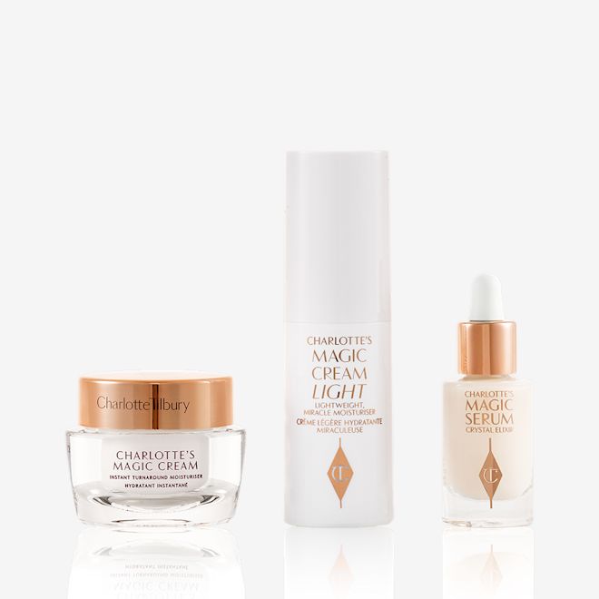 Guardaroba Magic Skincare - Prodotti Travel-size pearly-white cream in a glass jar with a gold-coloured lid, luminous serum in a glass bottle with a white and gold dropper lid, and face cream in a white-coloured bottle.