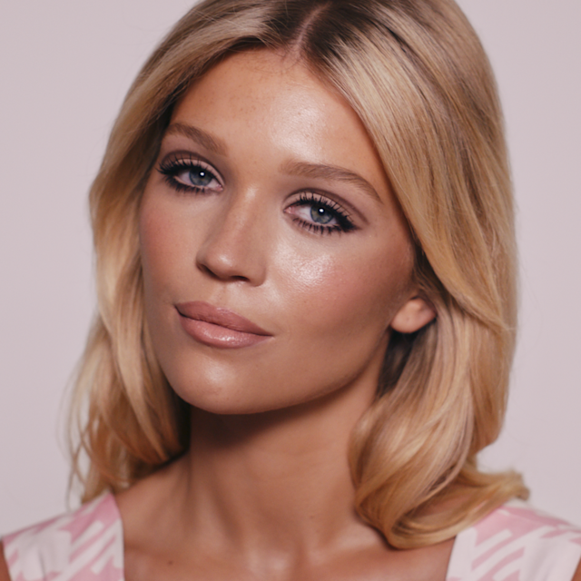 Step 10 of the 60s makeup tutorial: apply liquid blush to the cheeks