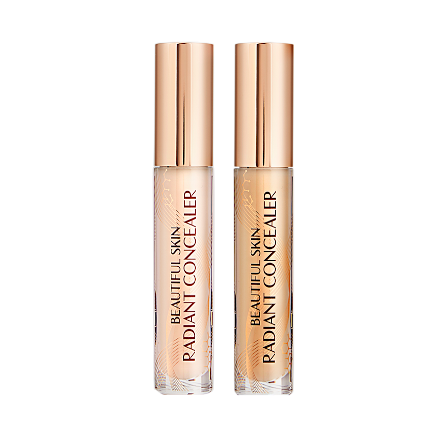 Two radiant concealers in glass tubes with gold-coloured lids, and text on the tubes that reads, 'Beautiful Skin Concealer'