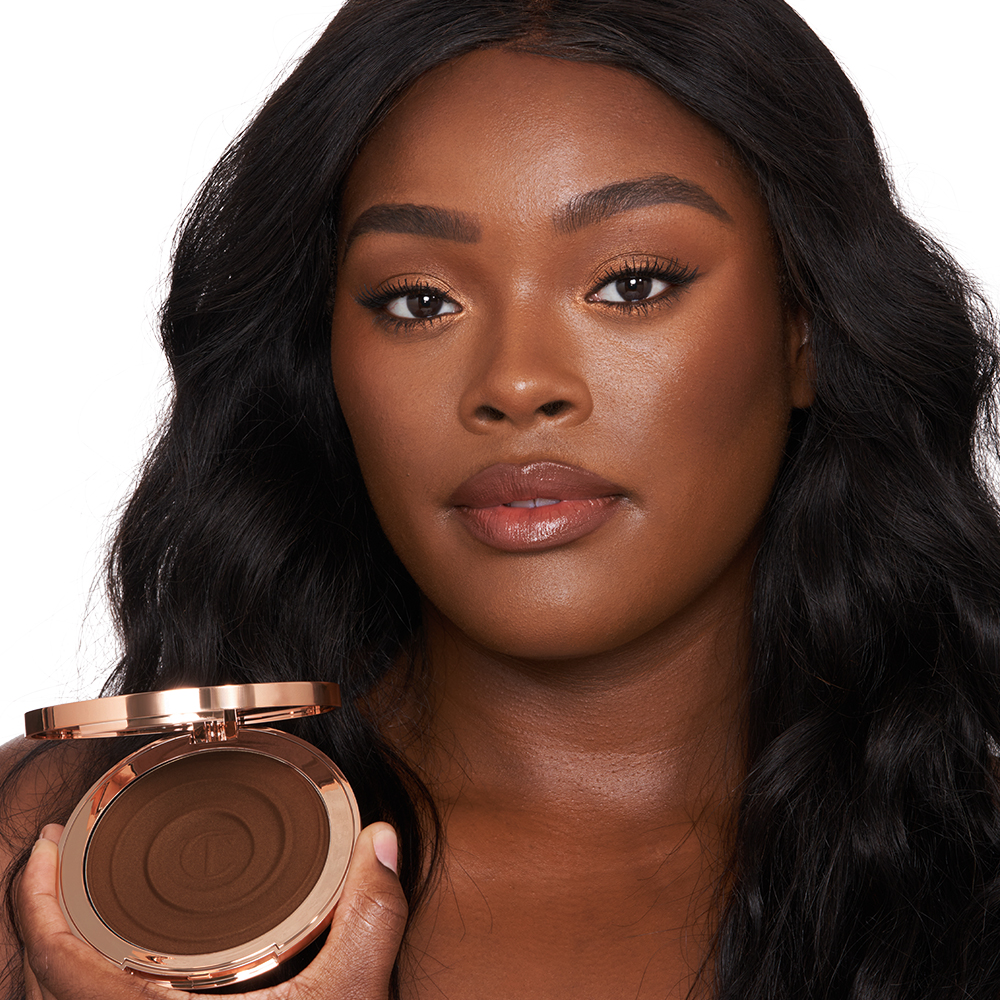 Model wearing bronzer to add warmth to their complexion