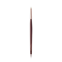 A slim eyeshadow brush with white-coloured bristles with a rose-gold and dark crimson handle. 