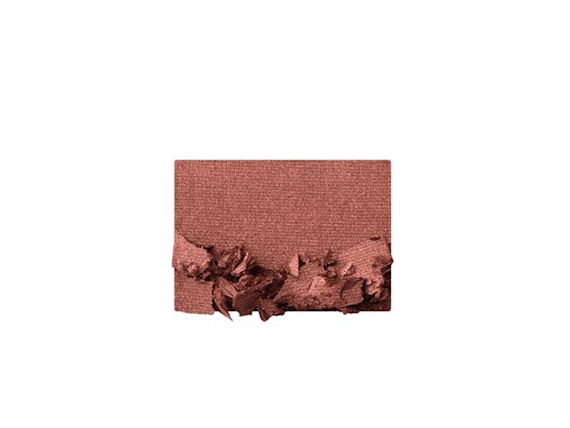 Swatch of a matte dark reddish brown eyeshadow. 