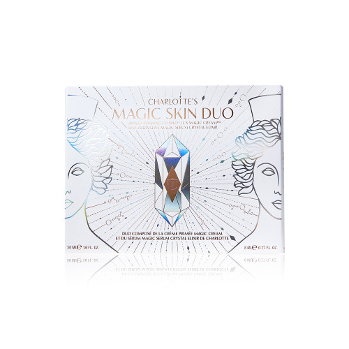 A closed skincare kit with a white coloured lid with shiny geometric patterns along with illustrations of goddesses on the lid, with the text, 'Charlotte's magic skin duo' written on the top. 