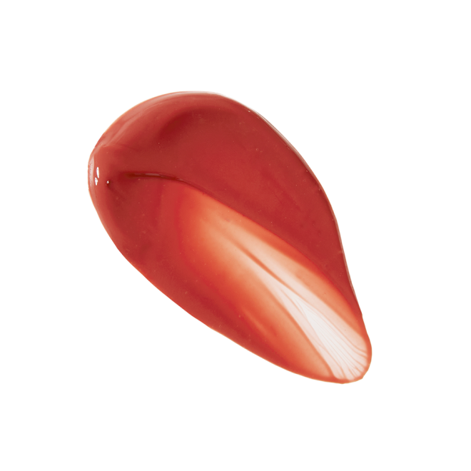 Swatch of a creamy lip and cheek tint in a warm, peachy-brown shade.