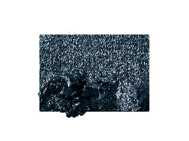 Swatch of a shimmery dark navy powder eyeshadow.