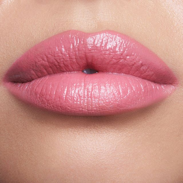 Model wearing Pillow Talk and Red Carpet Pink lip liner and lipstick combination