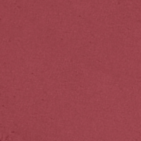 Swatch of a lipstick in a neutral rosy-pink colour with a matte finish.