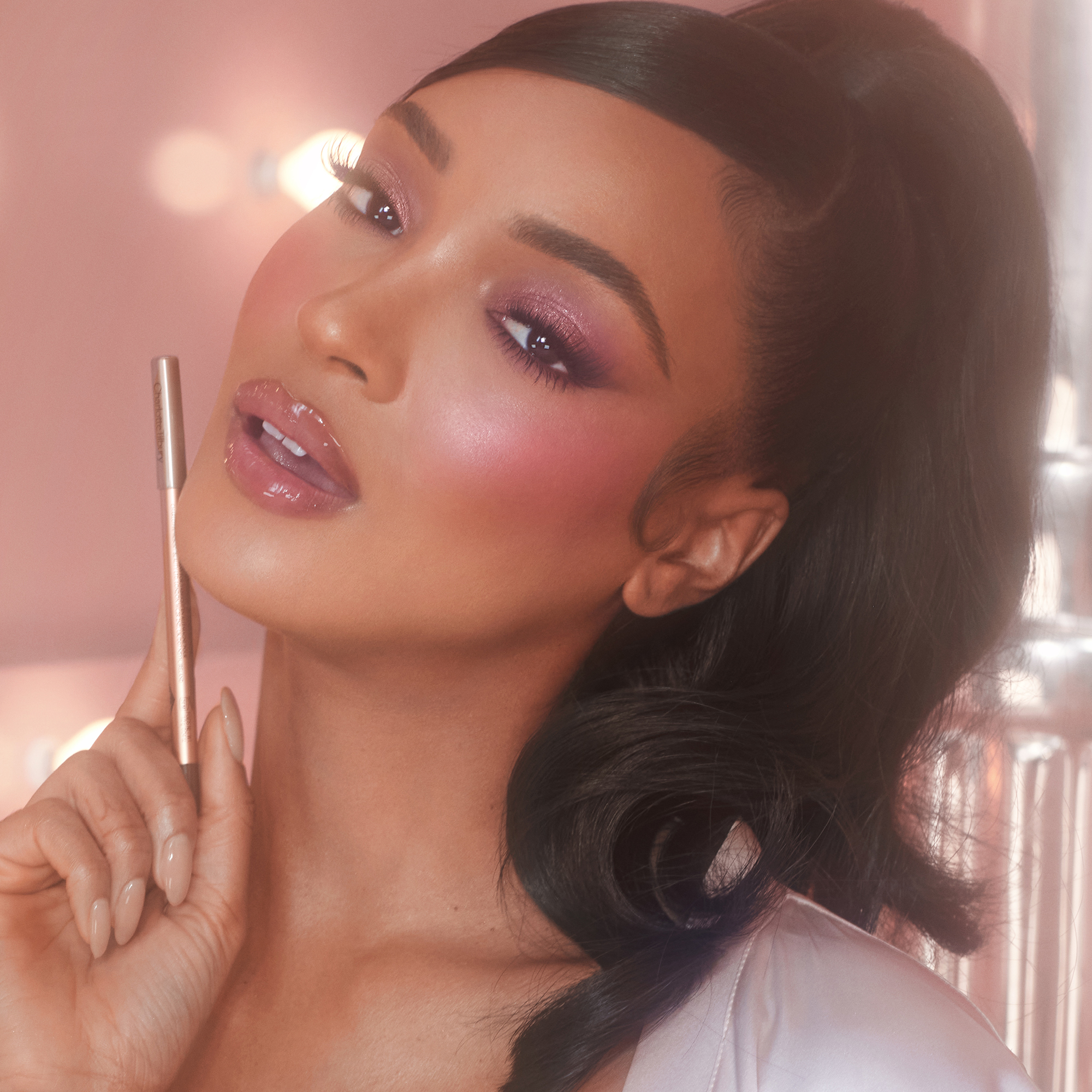 Lip Cheat in Pillow Talk Intense on deep-tone model