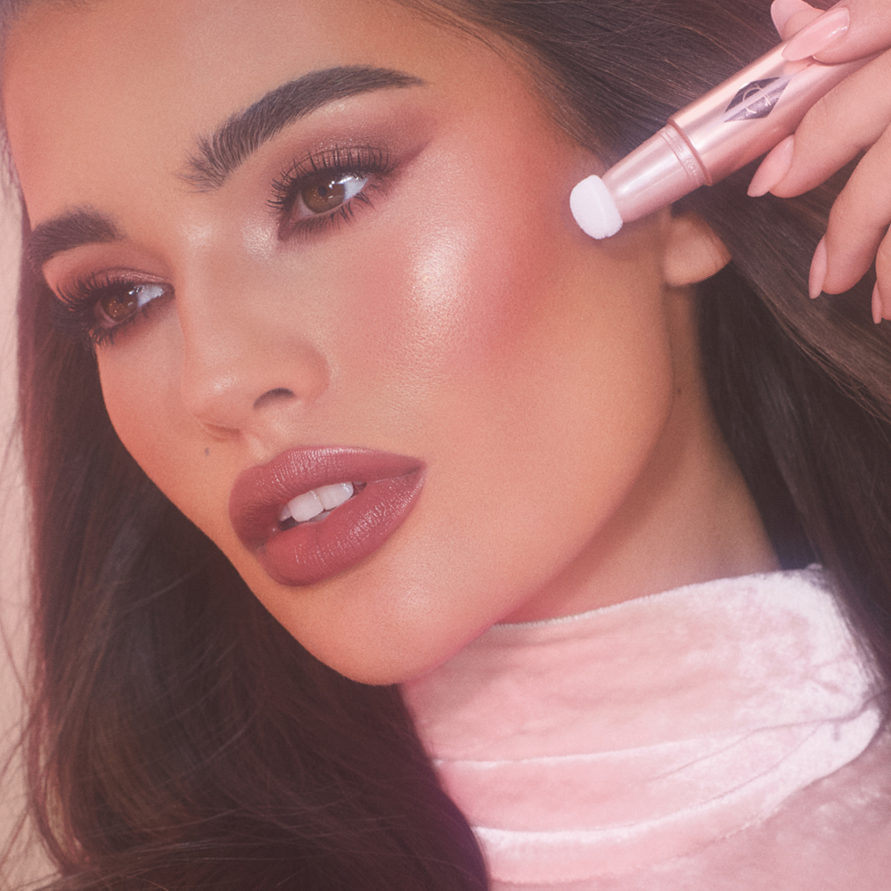 Pillow Talk Beauty Light Wand on model