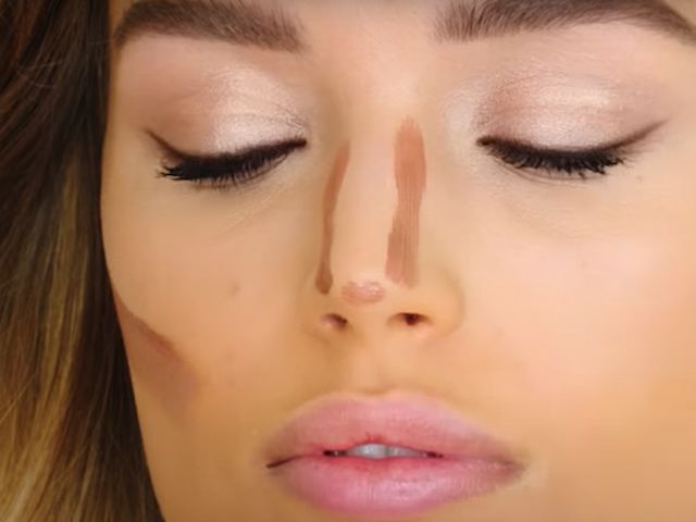 A light-tone model with unblended nose and cheek contour. 