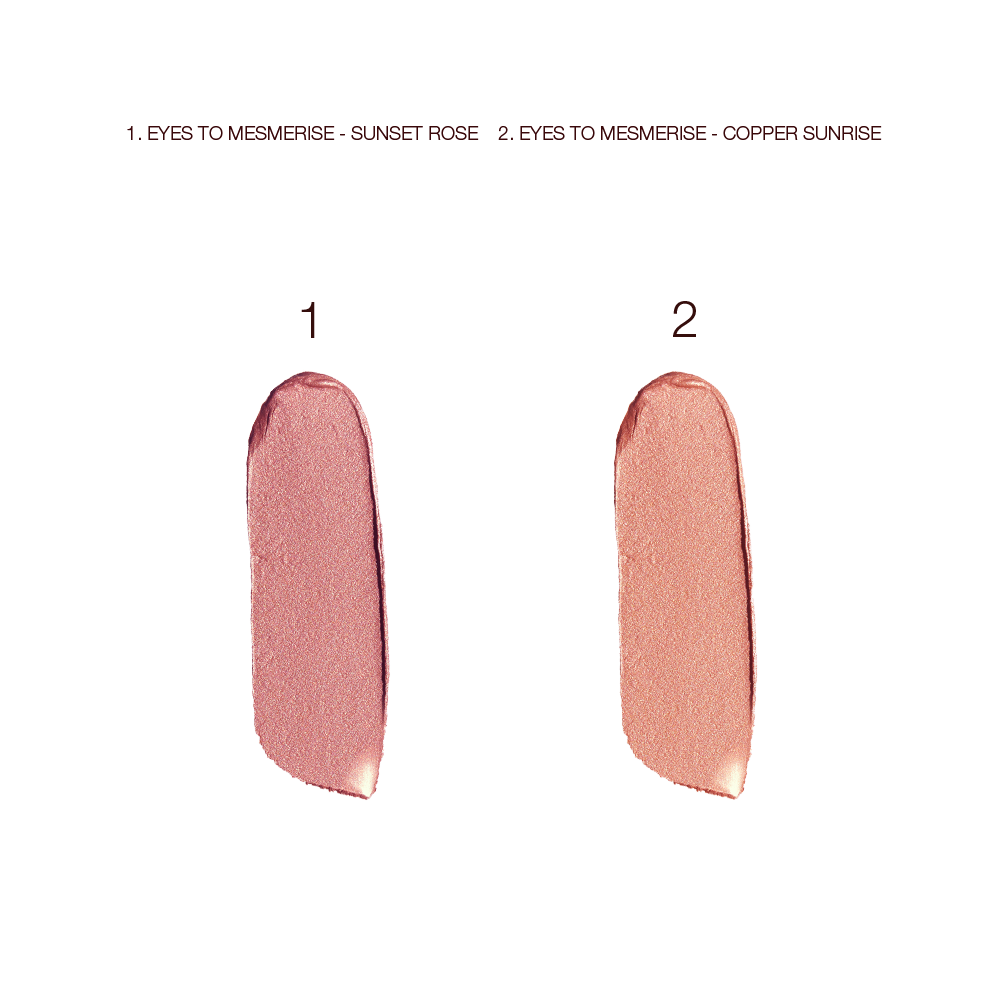 Swatches of two, glowy cream eyeshadows in dusky rose gold and coppery-champagne colours. 
