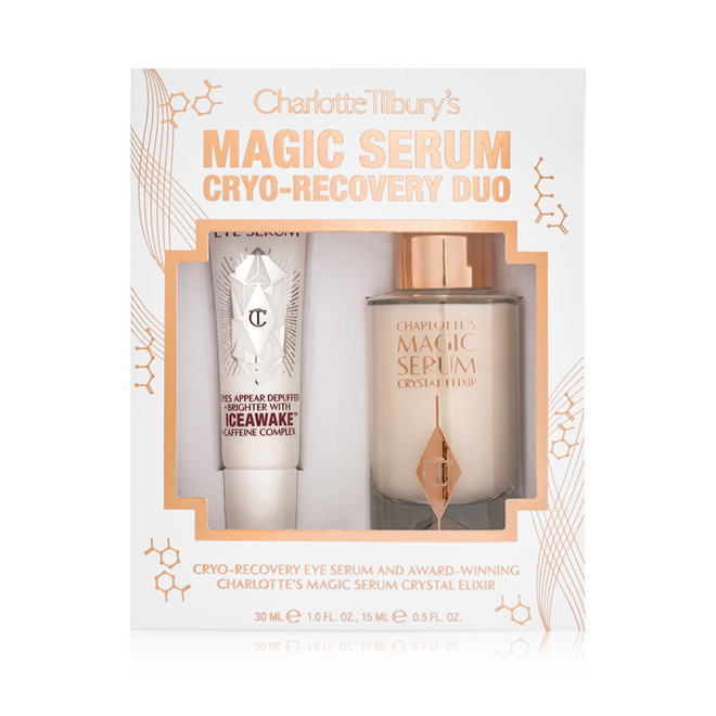 Eye serum in a white-coloured tube with geometric patterns on the front in a reflective, silver colour along with luminous, facial serum in a glass bottle with a white and gold dropper lid in a white and gold-coloured packaging box with text on it that reads, 'Magic serum cryo=recovery duo'