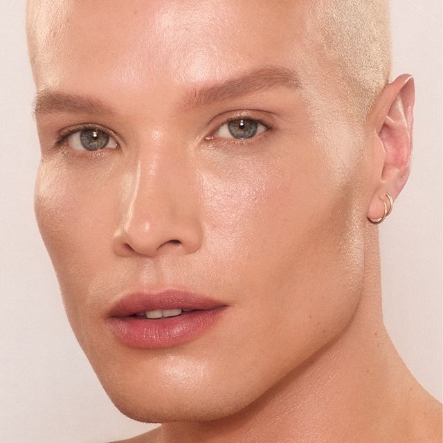 Daniel wearing shade 6 of Charlotte's Unreal Skin skin tint