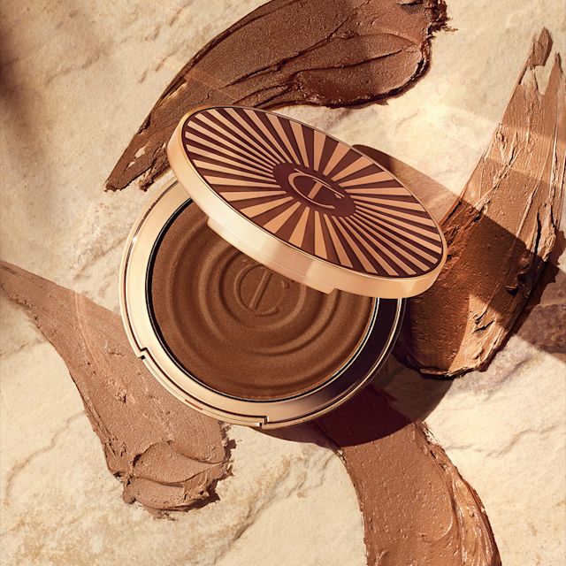 Beautiful Skin Sun-Kissed Glow Bronzer, a humidity-resistant beach makeup essential