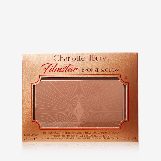 Filmstar Bronze and Glow packed Gold-coloured box with a duo contour palette inside it with Charlotte Tilbury Filmstar bronze & glow written on top of the box.