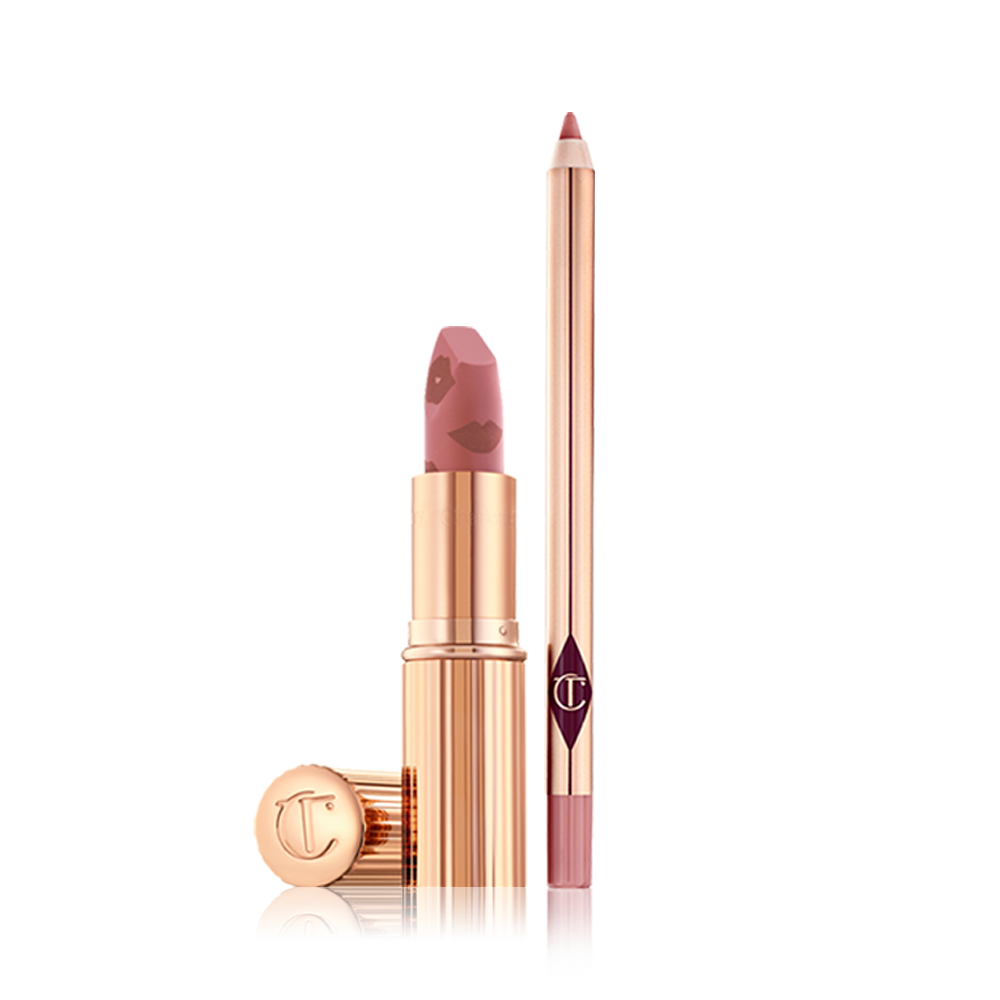 An open matte lipstick in a dusty pink shade with an open lip liner pencil in a nude pink shade. 