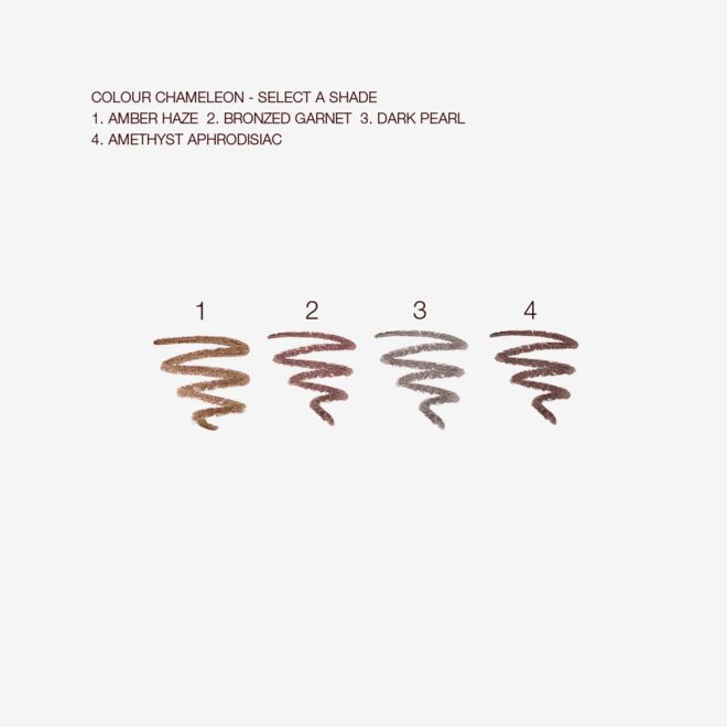 Colour Chameleon swatches Swatches of four eyeshadow sticks in amber, smokey red, grey, and dark purple colours.