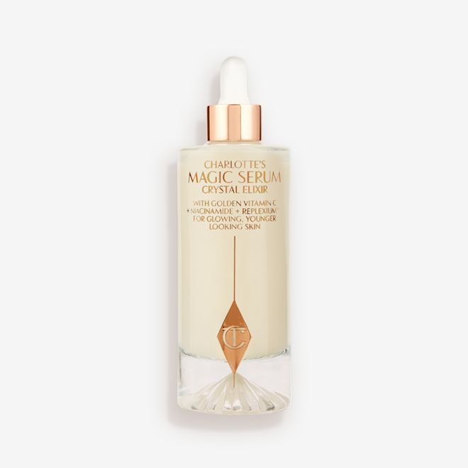 Magic Serum 100ml Closed A luminous, ivory-coloured facial serum in a glass bottle with a white and gold-coloured dropper lid