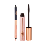 A double-sided eyeliner pencil in jet black and nude beige with an open mascara tube with its applicator next to it.