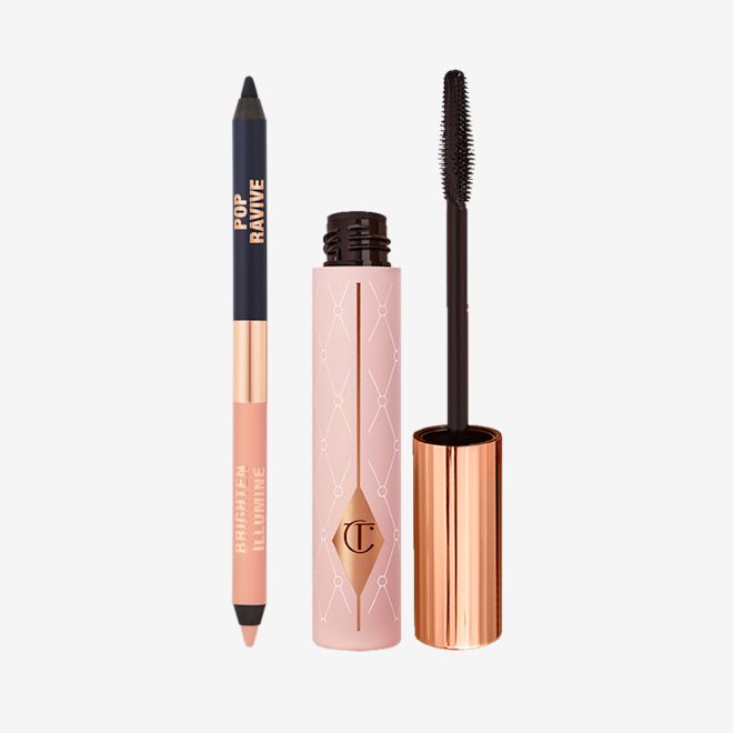 Wider Brighter Eyes Kit open A double-sided eyeliner pencil in jet black and nude beige with an open mascara tube with its applicator next to it.