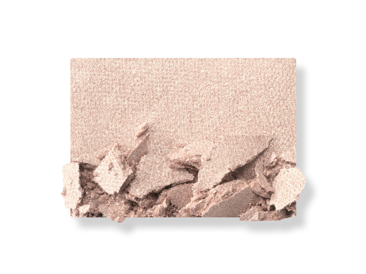 Swatch of a powder eyeshadow in a shimmery beige shade. 