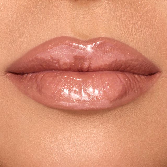 Nudegasm Diamonds plumping lip gloss en tono de piel medium