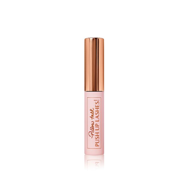 Pillow Talk Mini Mascara closed A travel-size mascara in a pink-coloured tube with a gold-coloured lid.