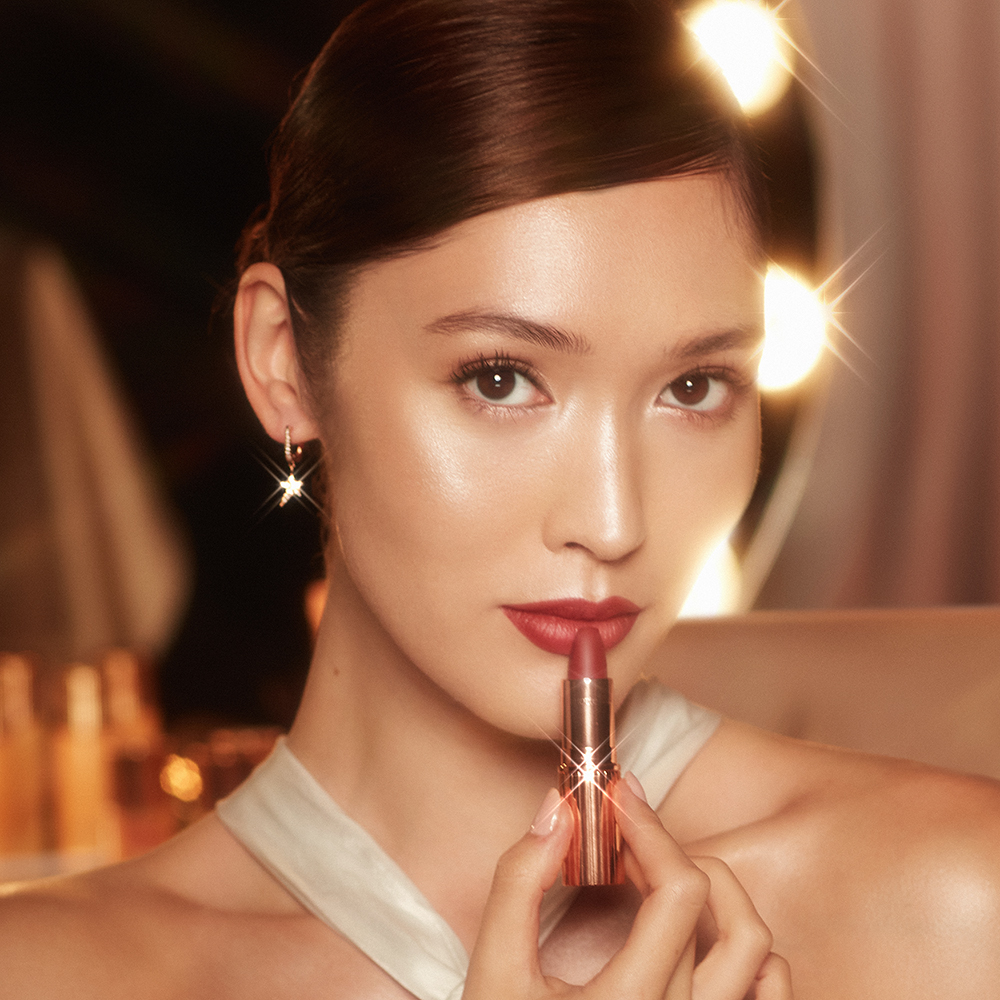 Aimee wearing Walk of No Shame berry red lipstick